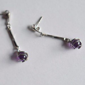 Silver drop earrings with light purple globes